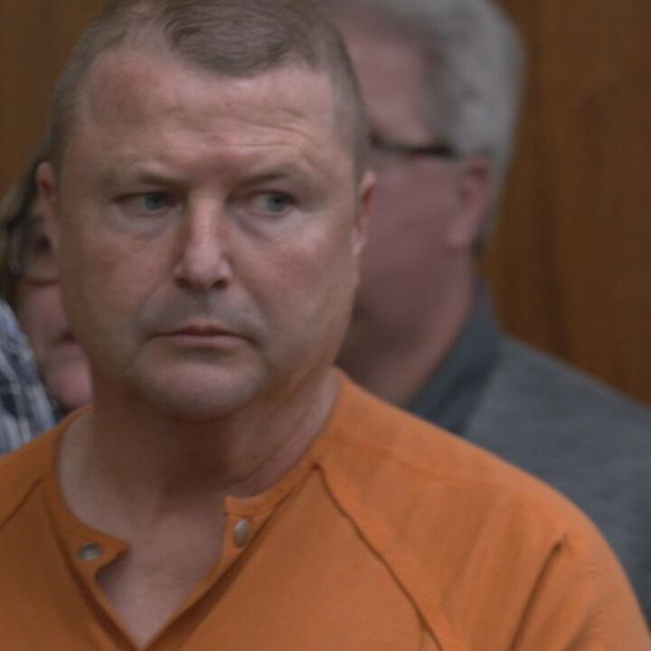 Jamey Noel in orange jumpsuit